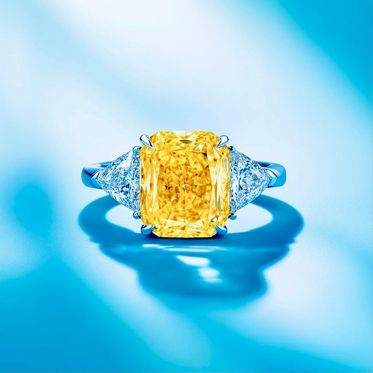 Fancy Yellow Diamond Trilogy Ring in Platinum