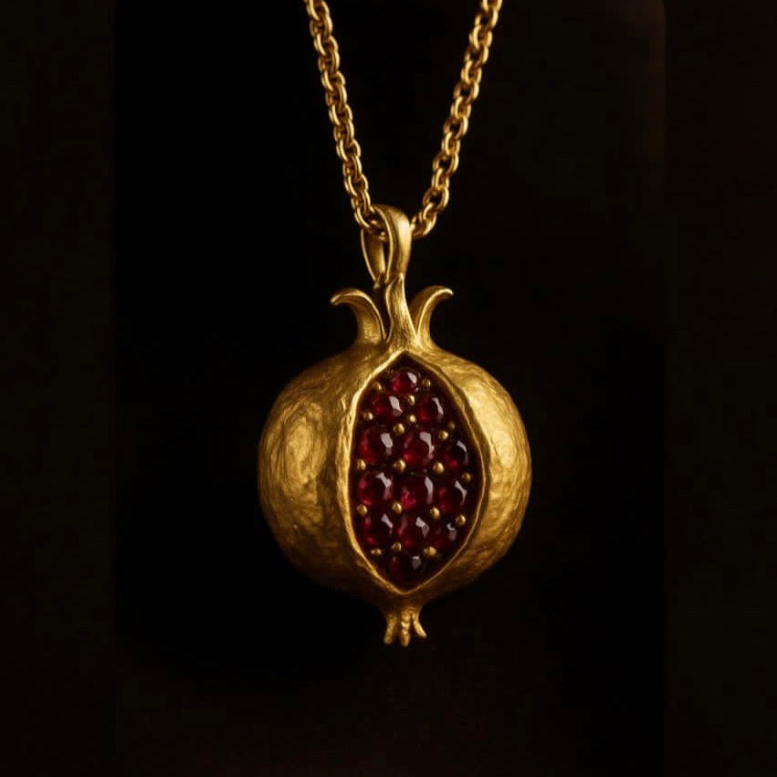 Pomegranate pendant with earth mined natural Ruby’s