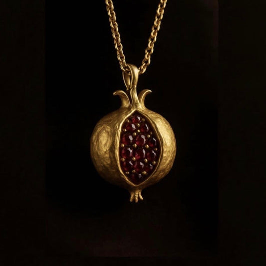 Pomegranate pendant with earth mined natural Ruby’s
