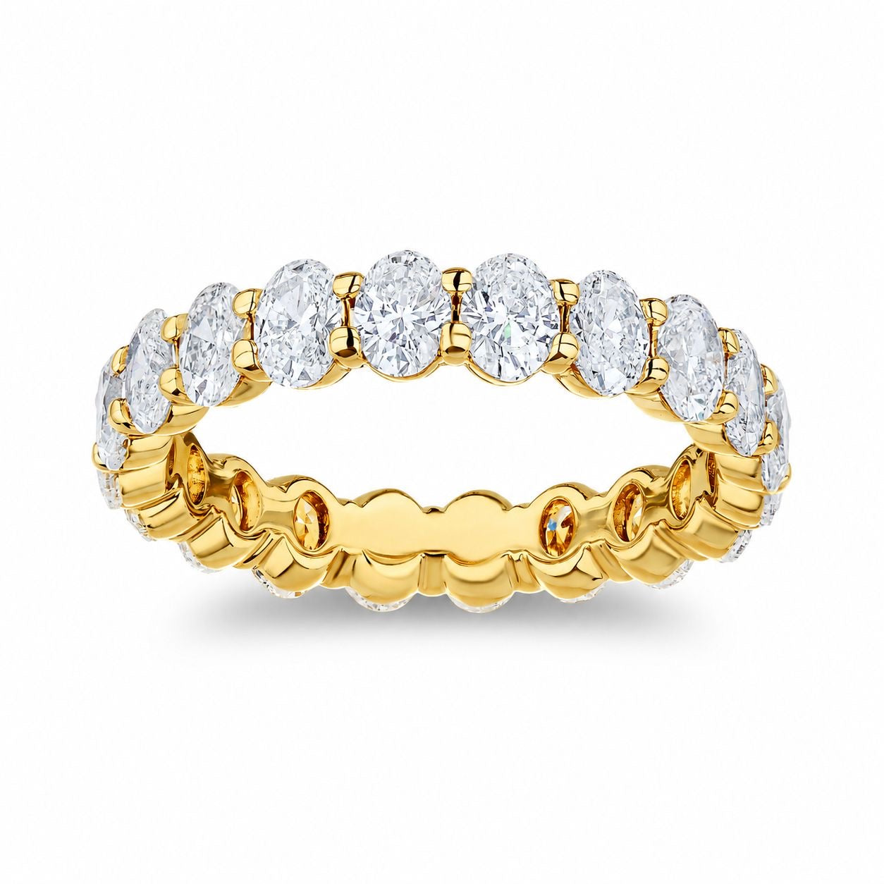 Classic oval Diamond engagement ring. 18k yellow gold with matching my eternity band