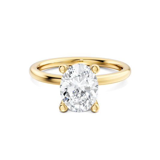 Classic oval Diamond engagement ring. 18k yellow gold with matching my eternity band