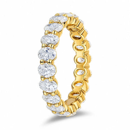 Classic oval Diamond engagement ring. 18k yellow gold with matching my eternity band