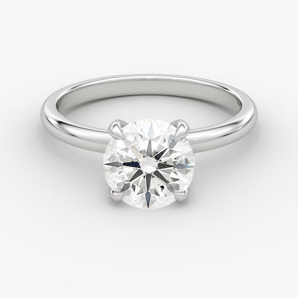 Ensemble de deux alliances en platine (solitaire rond 2 carats et alliance classique)